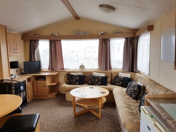 Homely Holidays Living Area