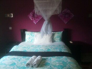 Royal Olympia Lodges And Safaris Guestroom