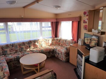 Homely Holidays Living Area