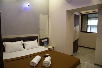 Welcome Guest House Guestroom