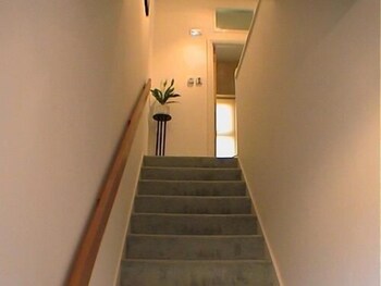 Earle House Serviced Apartments Staircase