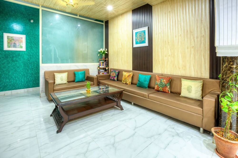 Treebo The Lily Lobby Sitting Area