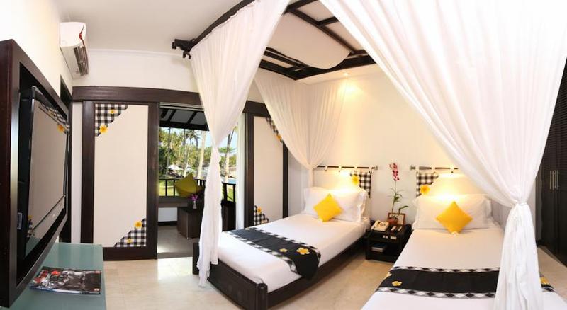 Candi Beach Resort & Spa Room