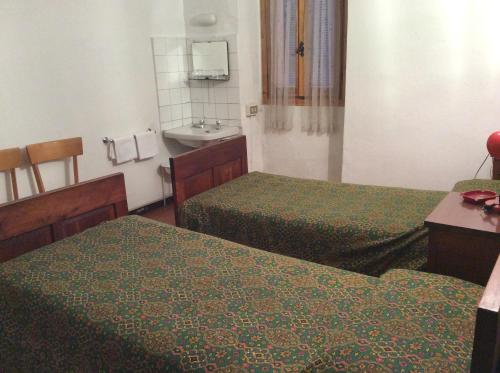Albergo Cervo (آلبرگو كروو) 