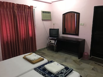 Indraprastham Tourist Home Guestroom