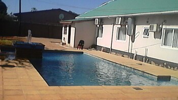Royal Olympia Lodges And Safaris Outdoor Pool