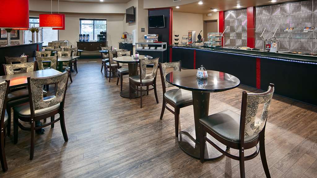 Best Western Premier Crown Chase Inn & Suites Our chic & comfortable breakfast area where we offer a free hot deluxe breakfast with made-to-order omelets available daily.