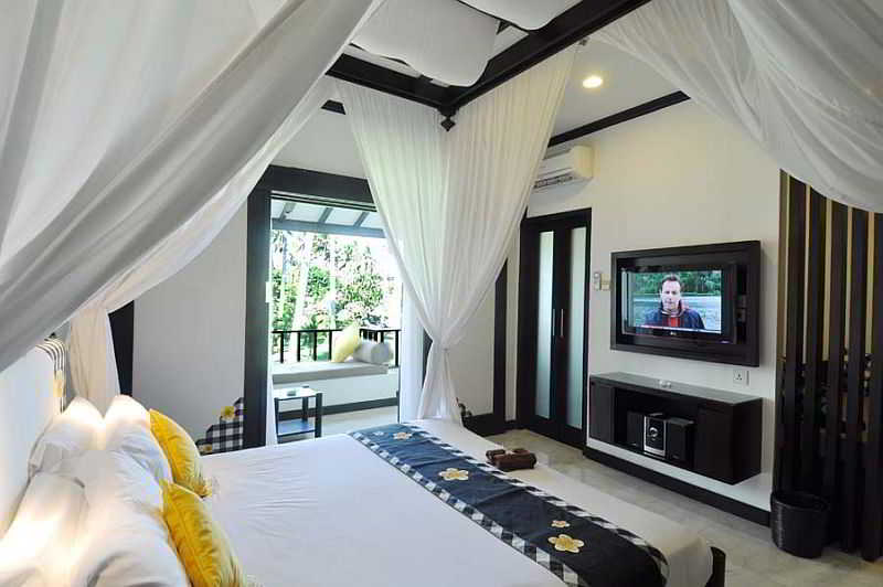 Candi Beach Resort & Spa Room