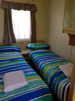 Homely Holidays Guestroom