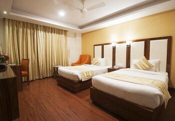 Merriment Hotels By Ecom Mechanics Guestroom