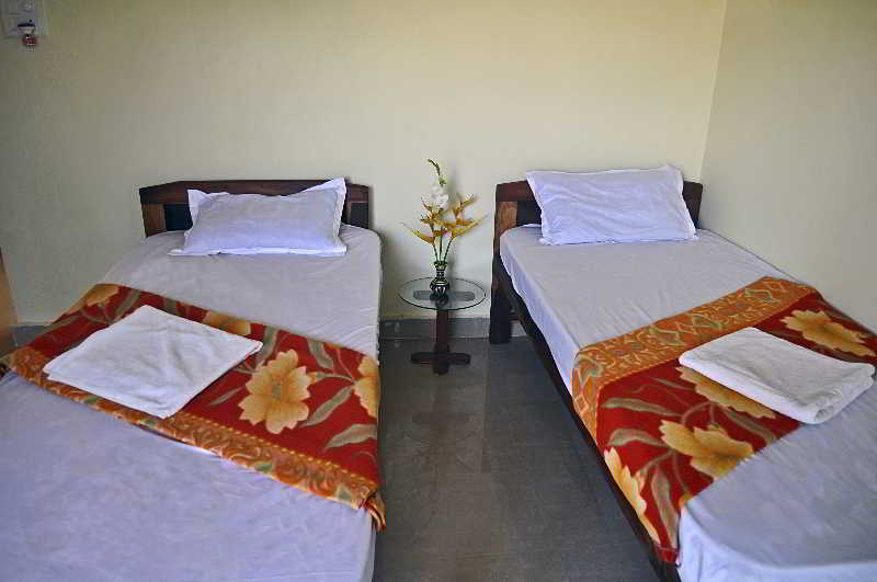 Oasis Beach Resort Room
