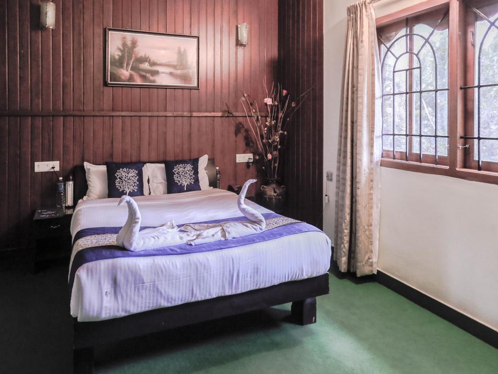 Oyo Rooms 041 Tagore Mount Cottages 