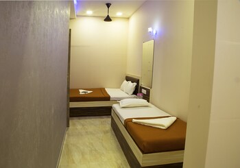 Welcome Guest House Guestroom