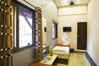 Welcome Guest House Guestroom