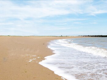 Homely Holidays Beach