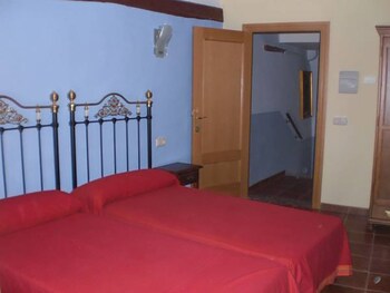 Unike Hospedería El Pilar Guestroom