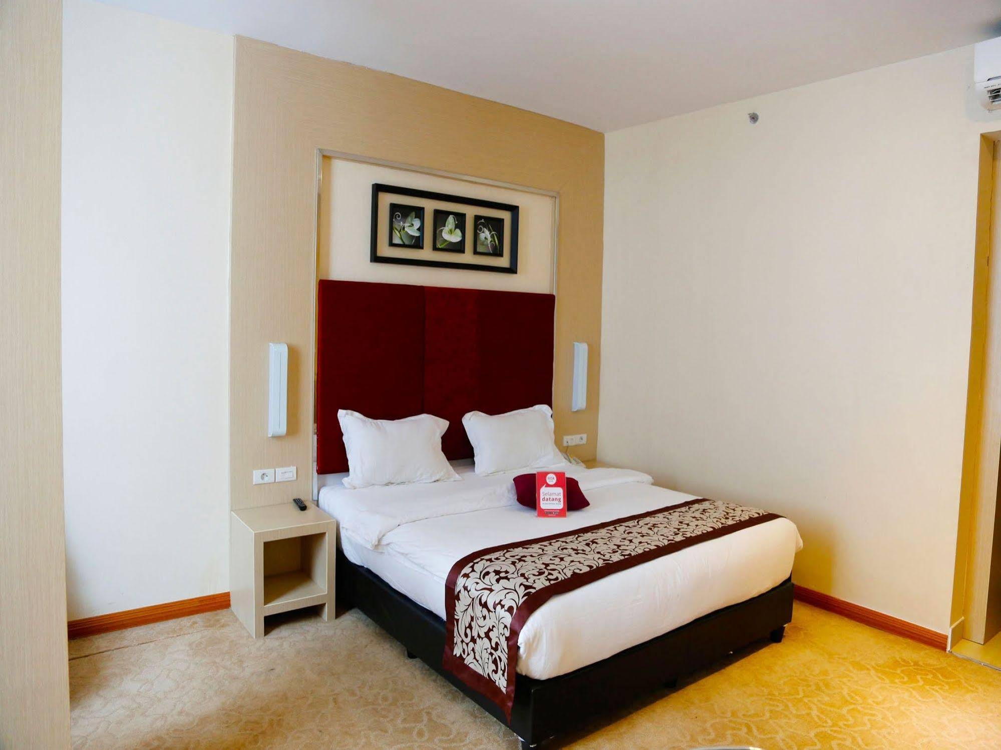 Nida Rooms Water Front Lubuk Baja (نیدا رومز واتر فرونت لوبوك باجا) 