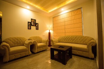 White Mushroom Jaipur V Inn Living Area