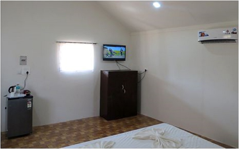 Morjim Beach Resort Room
