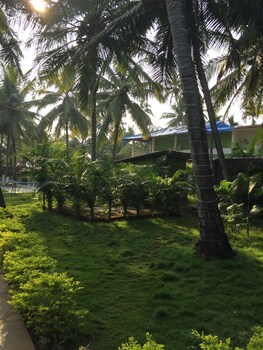 Morjim Coco Palms Resort Property Grounds