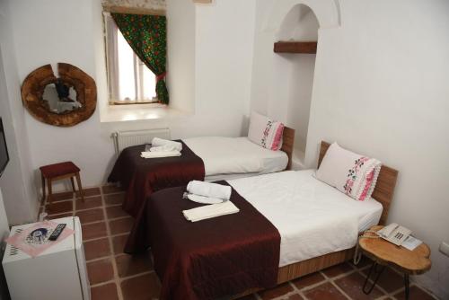 Merzifon Tarihi Taşhan Hotel (مرزیفون تاریهی تاşهان هتل) 