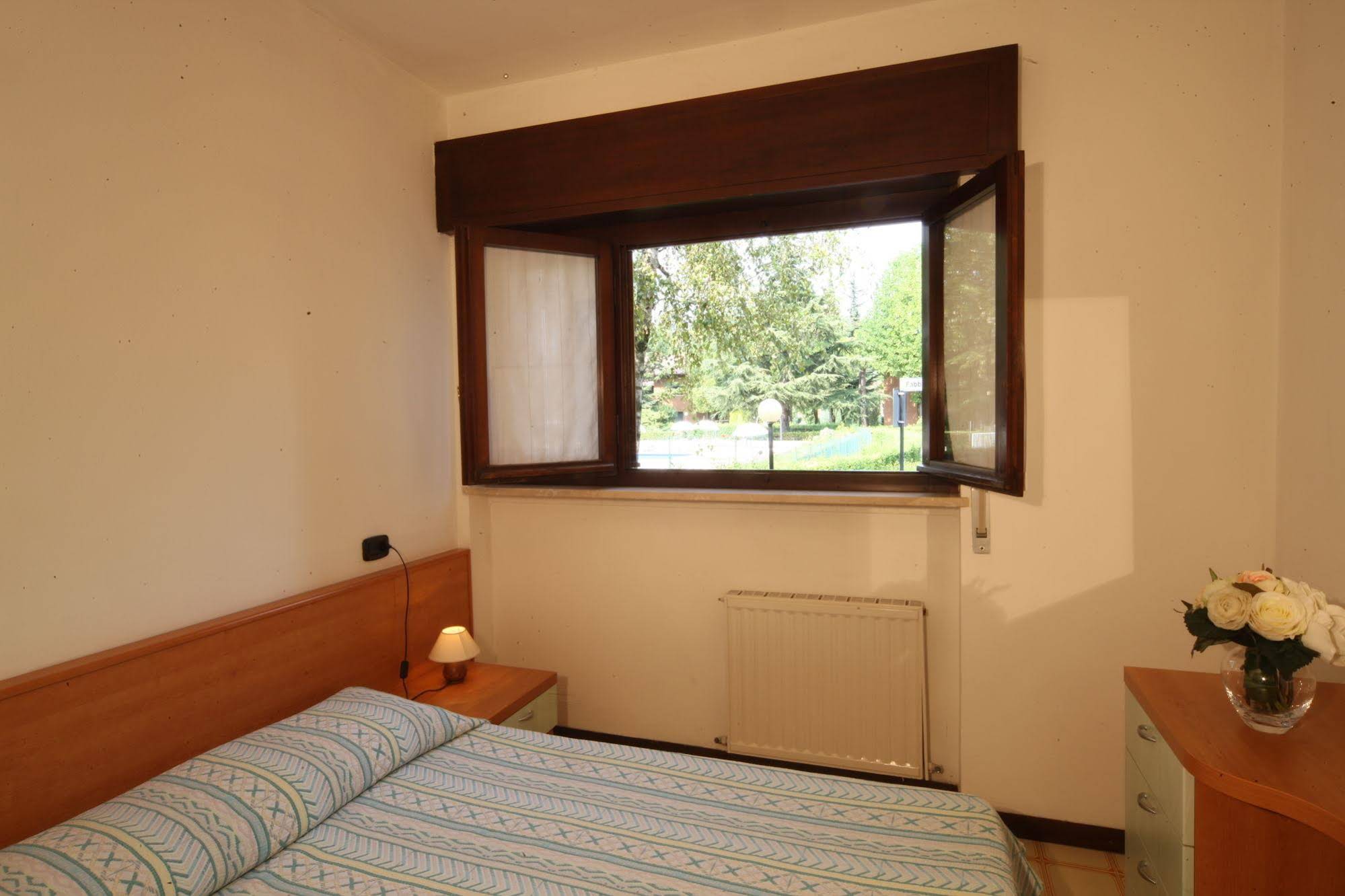 Appartamenti Punta Grò (آپارتامنتی پونتا گرò) 
