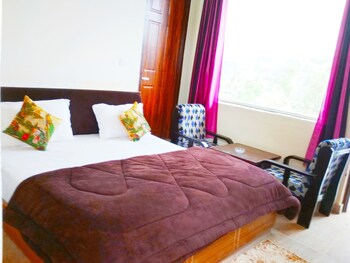 Silver Dew Resorts Guestroom