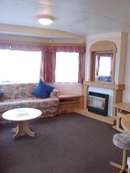 Homely Holidays Living Area