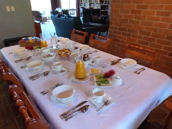 Morepork Riverside Lodge Breakfast Area