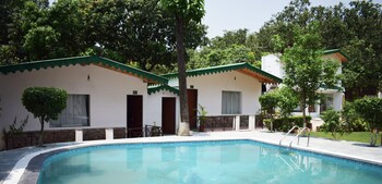 One Hotels Jim Corbett Guestroom View