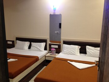 Welcome Guest House Guestroom
