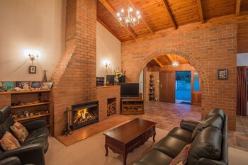 Morepork Riverside Lodge Fireplace
