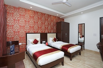 Oyo 11044 Hotel Tulip Suites Guestroom