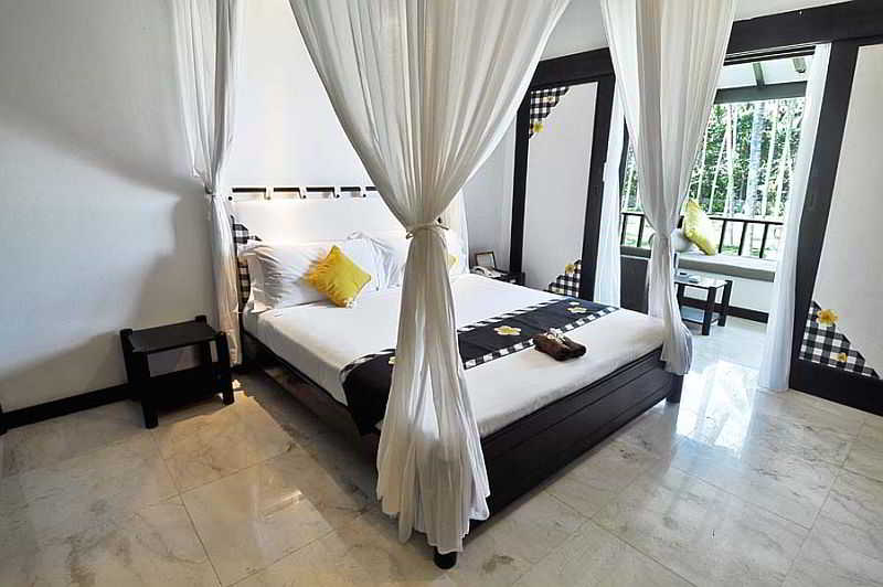 Candi Beach Resort & Spa Room
