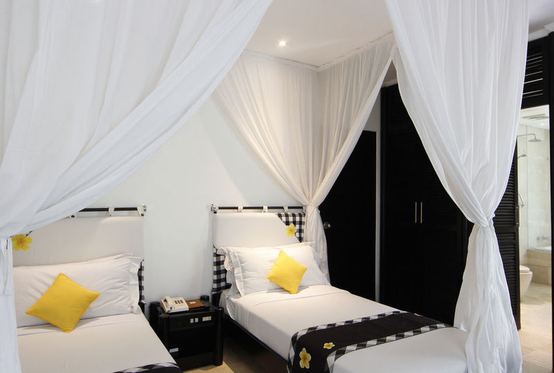 Candi Beach Resort & Spa Room