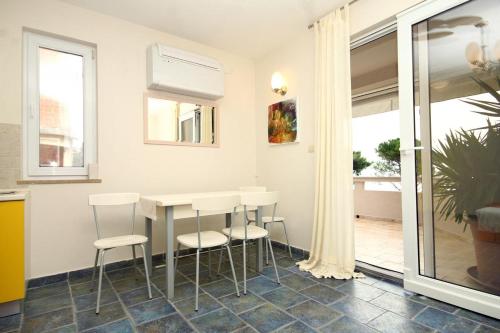 Apartment Novalja 9414b 
