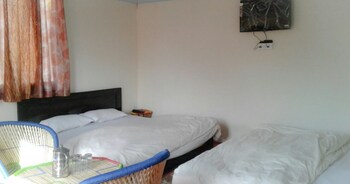 Silver Dew Resorts Guestroom