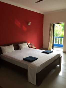 Morjim Coco Palms Resort Guestroom