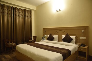 Oyo 6675 Hotel Comfort Inn Guestroom