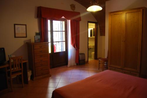 Hotel Fattoria Belvedere (هتل فاتوریا بلودر) 