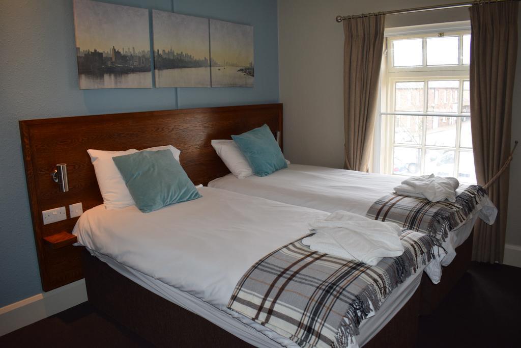 Woolpack Hotel (وولپاک هتل) 