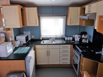 Homely Holidays In-Room Kitchen