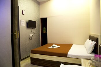 Welcome Guest House Guestroom