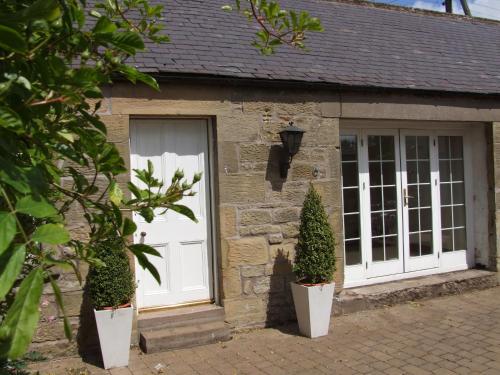 The Coach House Self Catering Apartment ( كواچ هاوس سلف كاترینگ آپارتمان) 