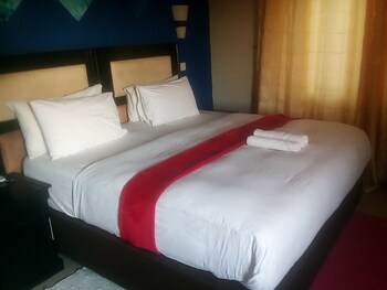 Royal Olympia Lodges And Safaris Guestroom